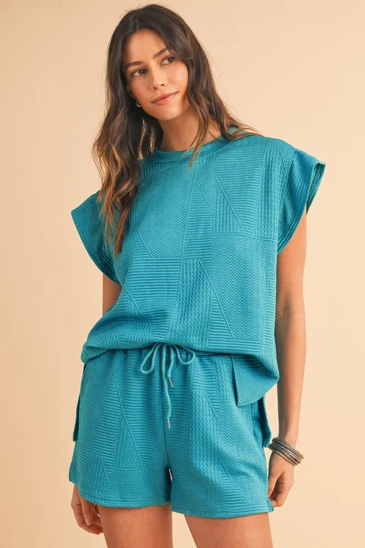 SHEWIN INC. Textured Ruffle Split Top and Drawstring Shorts