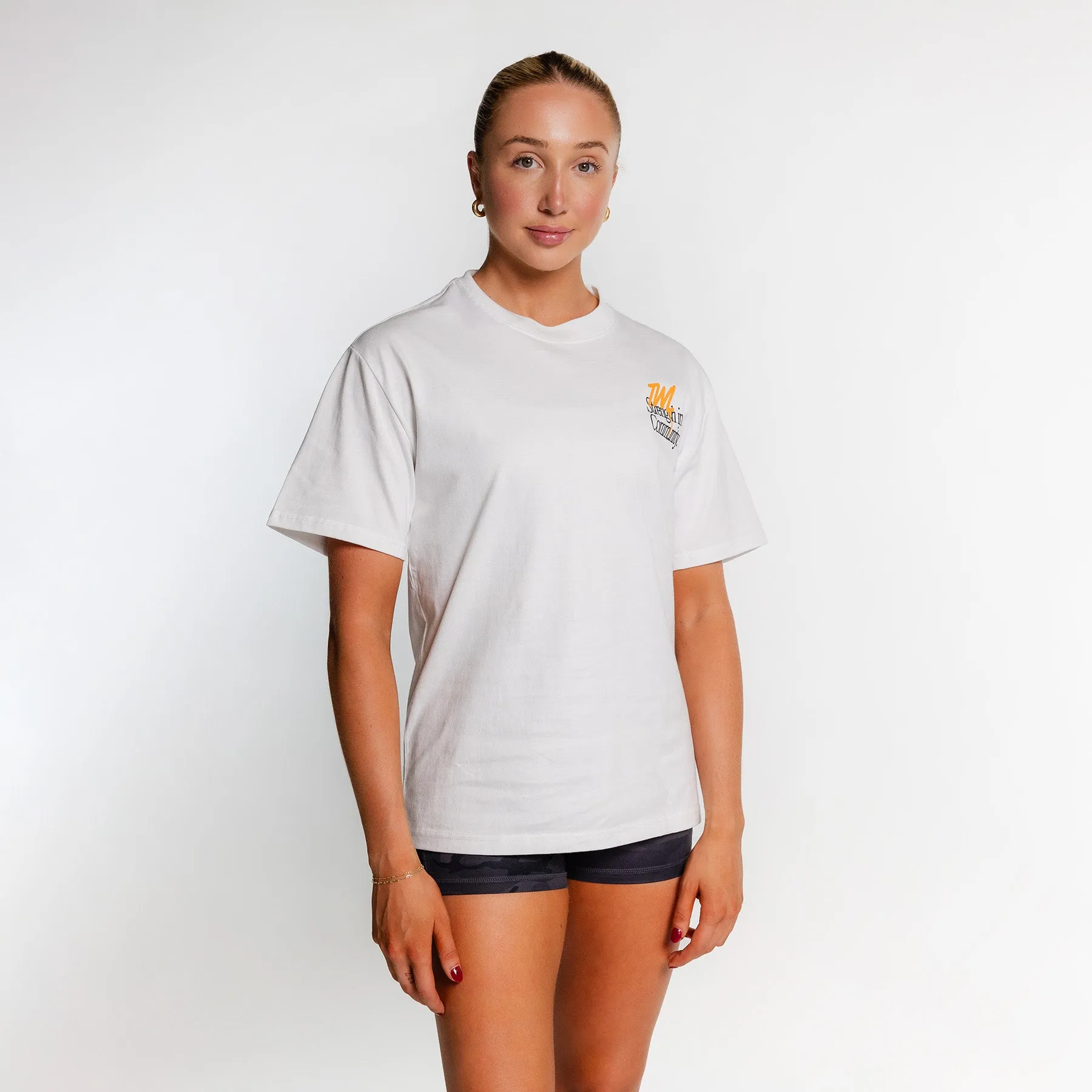 TWL - LIFESTYLE OVERSIZED T-SHIRT - STRENGTH IN COMMUNITY - FADED WHITE/ORANGE