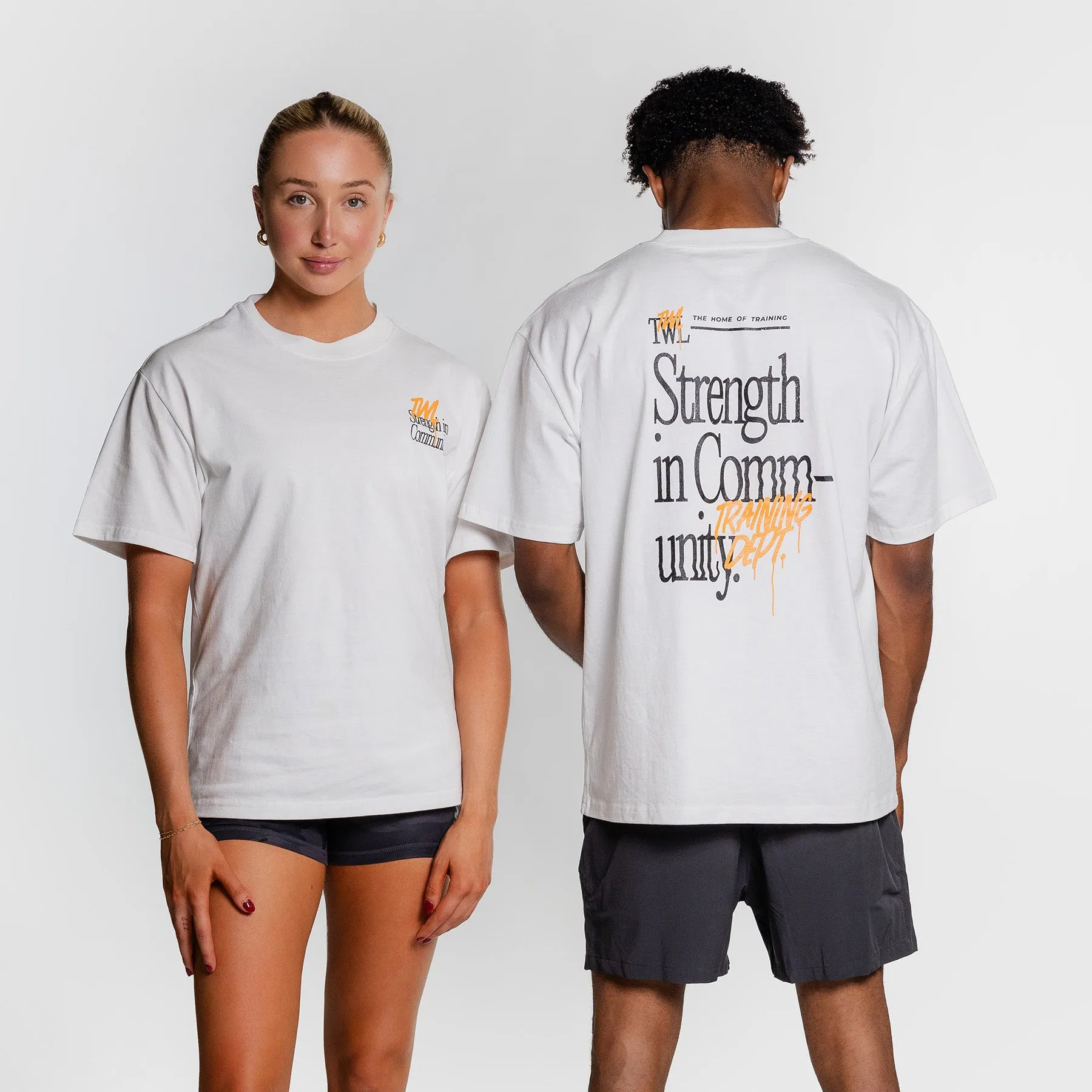 TWL - LIFESTYLE OVERSIZED T-SHIRT - STRENGTH IN COMMUNITY - FADED WHITE/ORANGE
