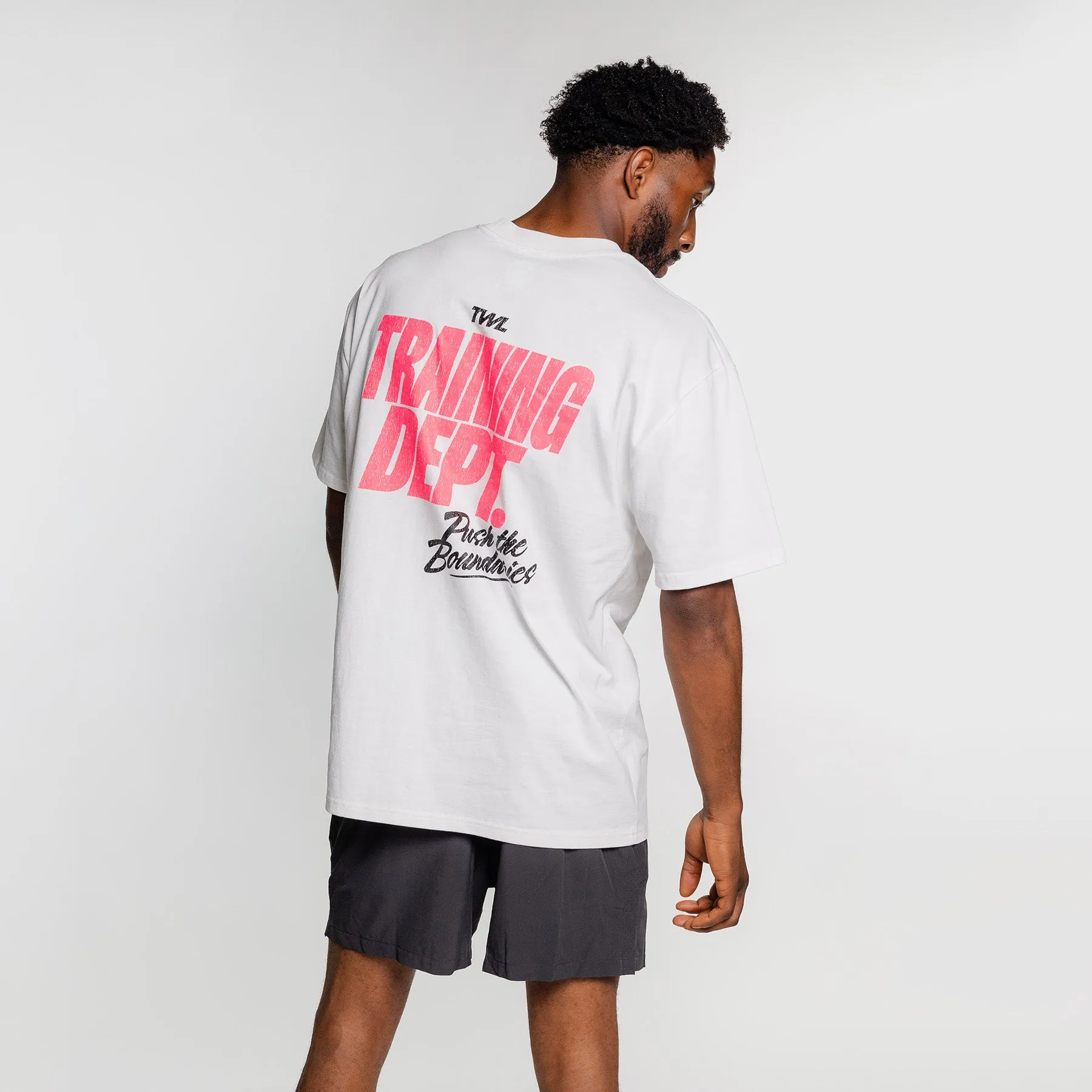TWL - LIFESTYLE OVERSIZED T-SHIRT - TRAINING DEPARTMENT - FADED WHITE/NEON PINK